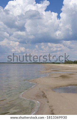 Background for design, landscape sunset over lake white gray clouds