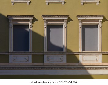 Background for design of a wall texture and windows of old houses
