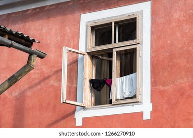 Background for design of a wall texture and windows of old houses.