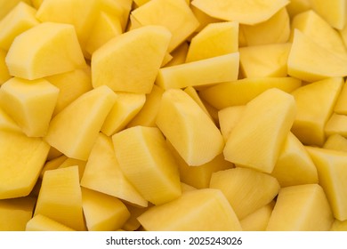 A background of diced raw potatoes