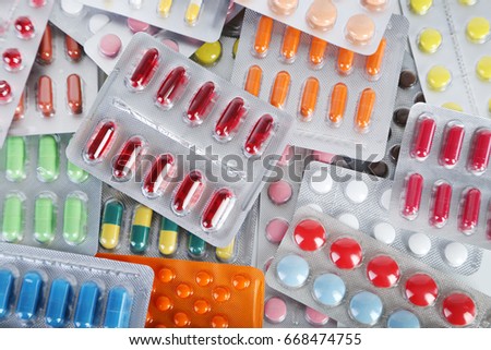 Background of different pills in the pack