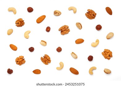 Background from different types of nuts and seeds. Isolated on white background. Flat lay, top view