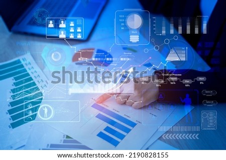 Background of documents with analytics data lying on table 