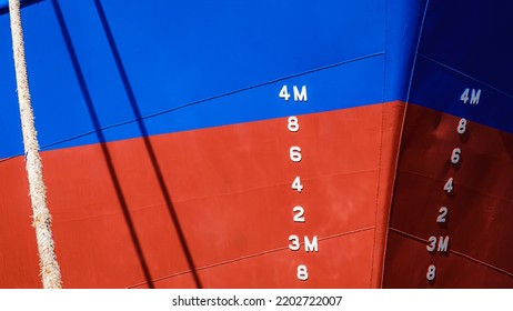 Background Of Draft Mark Numbers On Blue And Red Steel Hull Surface Of Nautical Vessel