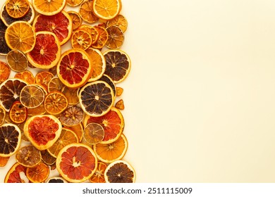 Background of dried citrus, fruits sliced orange and tangerine, lime and lemon, kumquat and grapefruit slices , preparation for the celebration of Christmas, copy space - Powered by Shutterstock