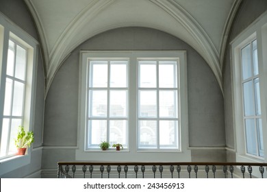 Background of empty big white classical room render with round vault ceiling above rectangular day light windows concrete frame in clear texture gray wall low key backdrop - Powered by Shutterstock