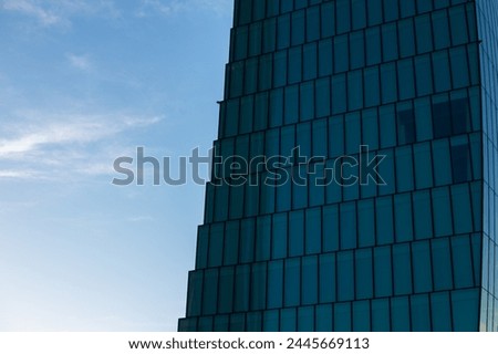 Background of facade of office building and blue sky. Milan, Italy. CityLife. Finance, economics, future concepts