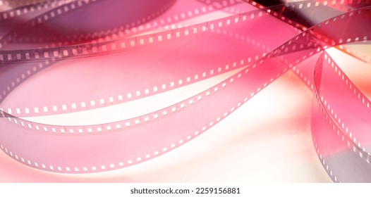 background with film strip.beautiful abstract background with film strip on colorful background with selective focus - Shutterstock ID 2259156881