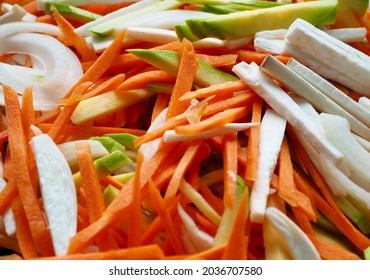 Background Of Finely Chopped Vegetables, Carrots, Onions, Zucchini And Mushrooms