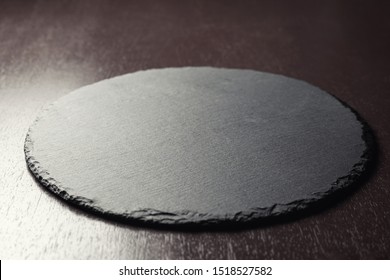 Background For Food Placement. Slate Board On A Wooden Table. 45 Degree Angle View.