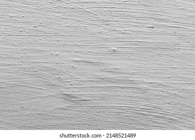 The background is in the form of a fragment of a plastered and whitewashed chalk wall. Tecture of whitewashed plaster.