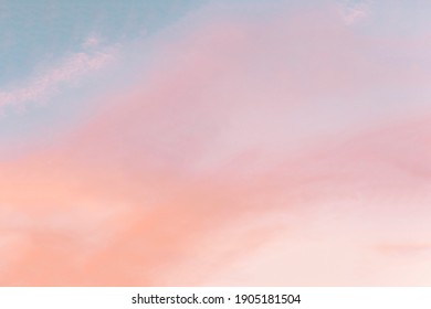 Background formed by bright pastel authentic sky during sunset  Pink  peach  blue blur elegant backdrop and empty space perfect for design   Light color gradient transitions 