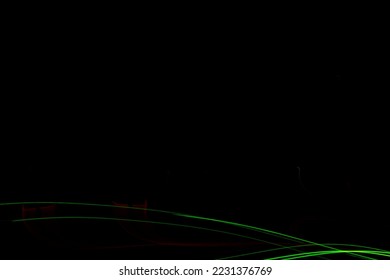 A background formed by linear patterns of green and red on a black background.