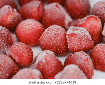 A background of frozen strawberries. Close up. - Powered by Shutterstock