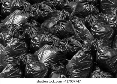 garbage waste, heap of garbage plastic waste black and trash bag many at  river park nature tree sunshine background, pollution lots waste plastic  trash, pile of plastic bags waste garbage many Stock