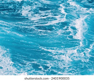 background of gentle ocean waves in the blue tropical sea - Powered by Shutterstock