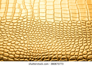 Background Of Gold Lizard Armor Pattern. Snake Yellow Or Golden Skin