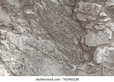 Background Of Gray Rocks. Gray Marble Background. Old Gray Stones. The island of Sicily, Italy.