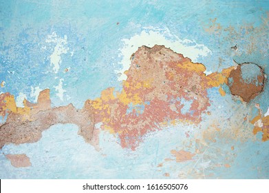 Background Of Grungy Distressed Peeling Blue Paint Revealing Layers Of Colors