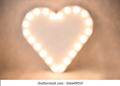 Background. Heart illuminated in a blur. Defocusing - Powered by Shutterstock