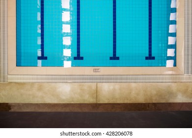 Background Of Hotel Swimming Pool With Space Edge Top View.