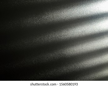 The background image of abstract blurred blackground with the gray, black and white color and roll of lighting.
