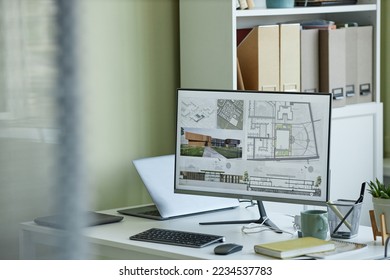 Background image of architects workplace, computer with 3D blueprints on screen, copy space 
