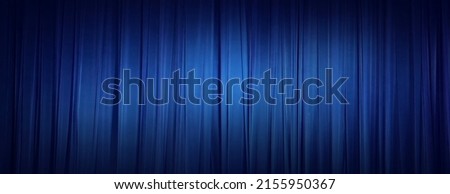 Background image of a blue velvet stage curtain 