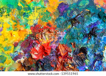 Background image of bright oil-paint palette closeup