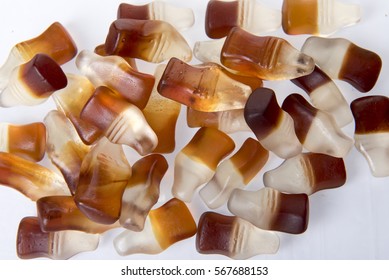 Background Image Of Cola Bottle Candy Sweets.