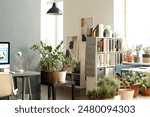 Background image of cozy contemporary office interior decorated with various green potted plants and lit by sunlight, no people, copy space