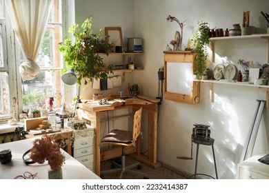 Background image of cozy workshop studio lit by sunlight with wooden details, copy space - Powered by Shutterstock