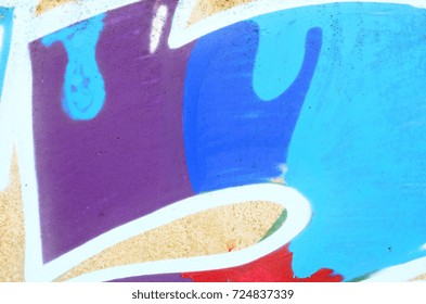 Background image with a graffiti pattern, which is applied to a concrete wall with aerosol paints