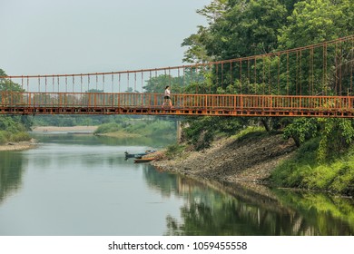 The background image includes bridge over river and pedestrian bridge.