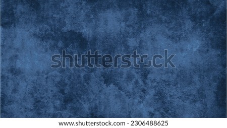Background image of plaster texture in dark blue tones in grunge style.