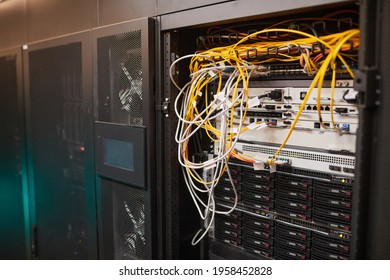 Background image of server cabinet with cables and wires at data center, supercomputer network, copy space