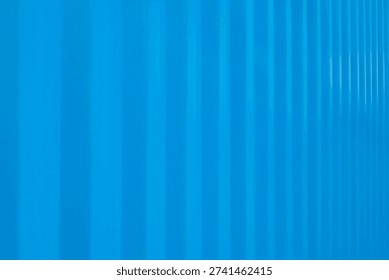 Background image of the side of a container, blue background with focus on the ribbed surface
