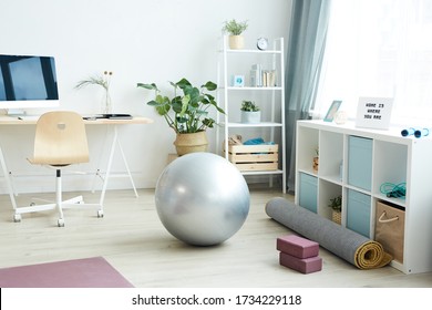 Background Image Of Various Sports Equipment On Floor In Small Apartment Studio, Home Workout Concept, Copy Space