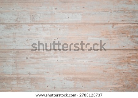 background image of weathered wood structure in soft pastel shade with scuffs and cracks on planks to create a vintage interior design layout or mockup basis