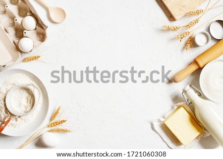 Background with ingredients for home baking decorated with wheat ears, copy space