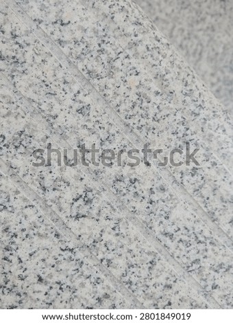 Background of irregular black and white flecks