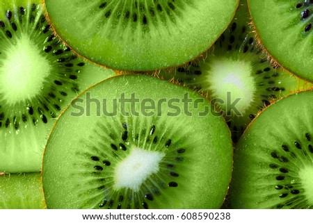 background made with a heap of sliced kiwi
