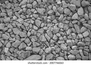 The Background Is Made Of Natural Gray Rubble. Broken Stone, Building Material. The Texture Of Granite, Rubble.