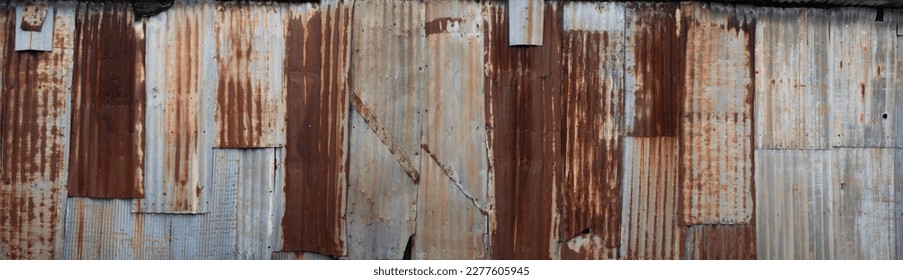 Background made rusted iron sheet metal   corrugated iron which are fastened together  Widescreen image