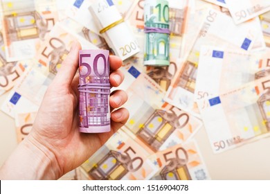 Background made of scattered euro bills 50, 100, 200, 500 banknotes. Money in hand. Business, finance, saving, banking concept Exchange Rates Interest rate mortgage - Shutterstock ID 1516904078