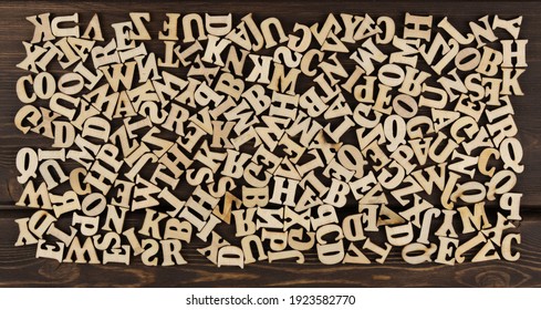 Background Is Made Of Wooden Jumbled Letters. English Alphabet.  Vintage Letterpress Types. English Language Day.