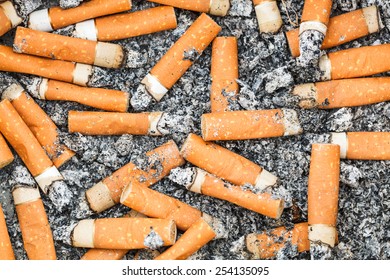 background from many cigarette butts and ash
