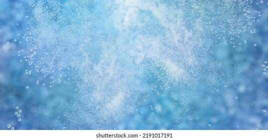 Background Of Many Small White Bubbles Or Air Balls In Clear Blue Water