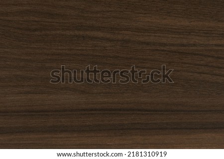Background material of dark brown wood. 