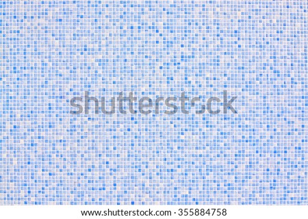 Background mosaic wall in blue color for copy space backdrop.